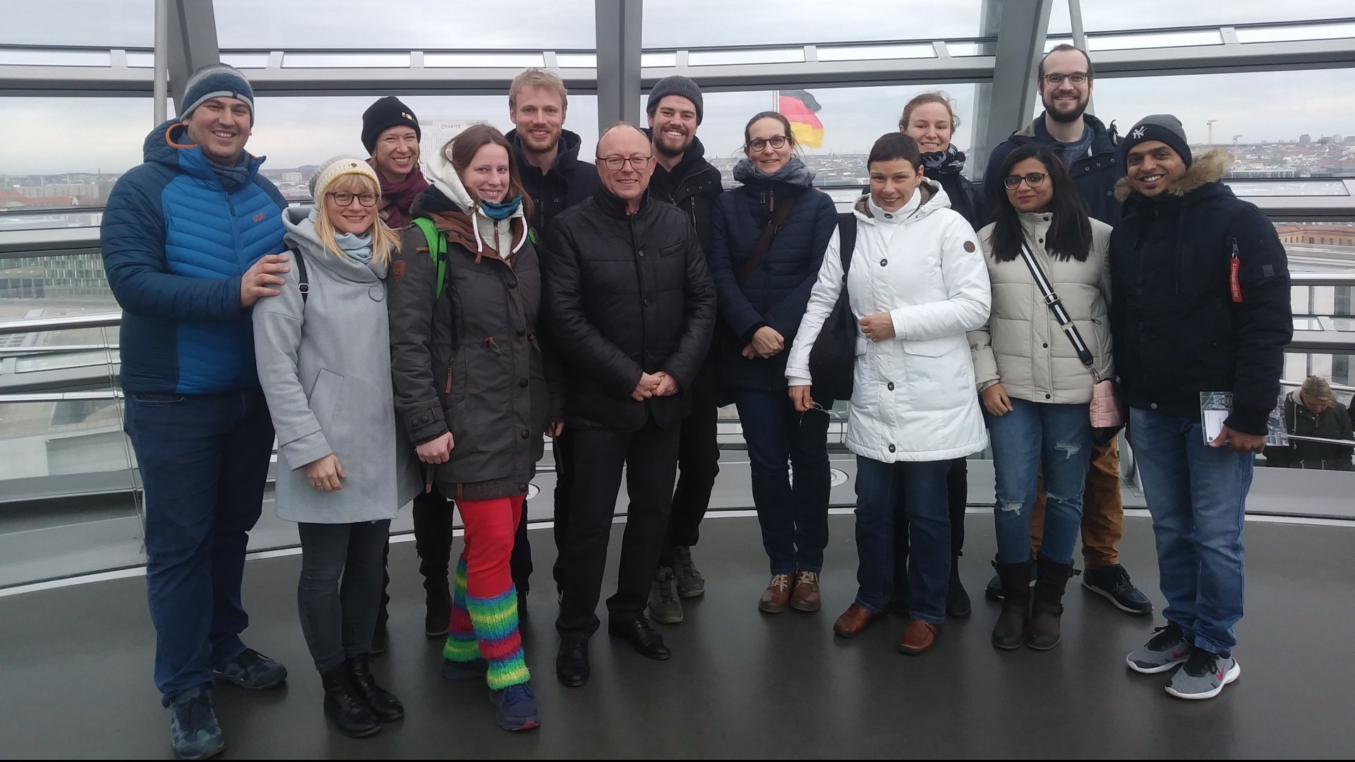 The group of visitors of the Bremen Max Planck Institute for Marine Microbiology in the dome of the Berlin Reichstag building.